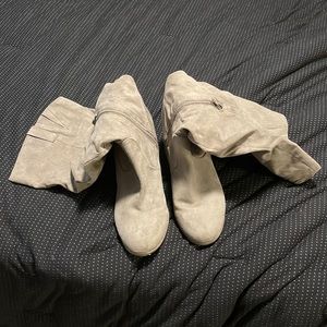 Knee high heeled boots